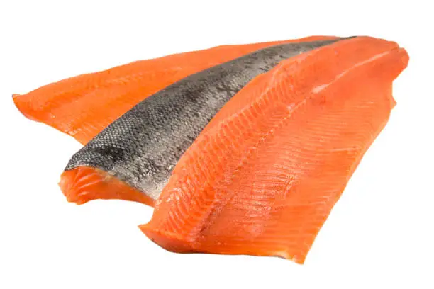 Sockeye Salmon fillet with skin, isolated on white.