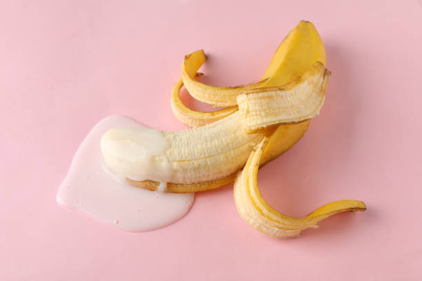 Banana on pink background. Fresh erotic fruit Banana on pink background. Fresh erotic fruit penis photos stock pictures, royalty-free photos & images