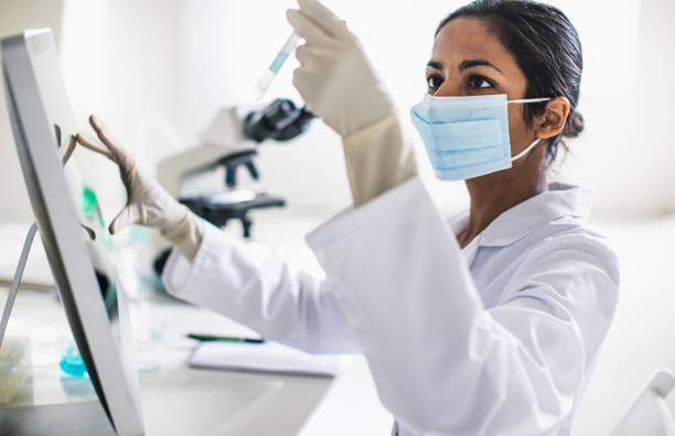 Scientist working in the laboratory Scientist working in the laboratory test tube stock pictures, royalty-free photos & images