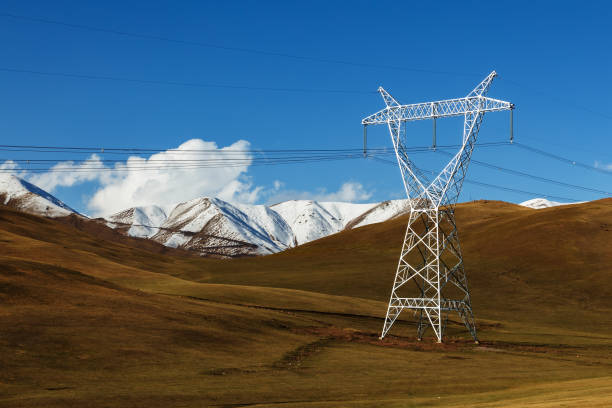 istock electricity pylons in the mountains. 1218520064