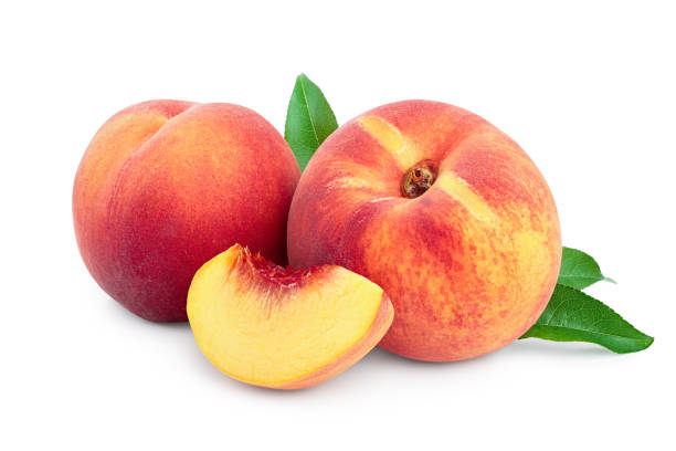 istock Ripe peach fruit and slice with leaf isolated on white background 1218521606