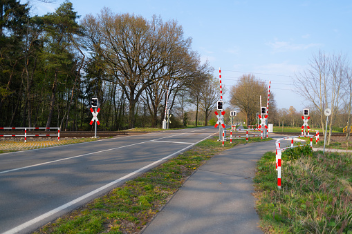 hude, germany,  April 13th, 2020: newly built barriers for the level crossing