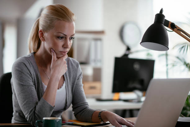 istock Young businesswoman working in office. 1218523184