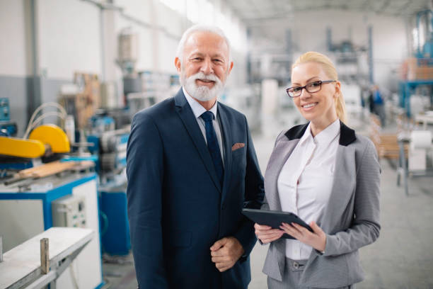 istock Colleagues working together in factory. 1218524296