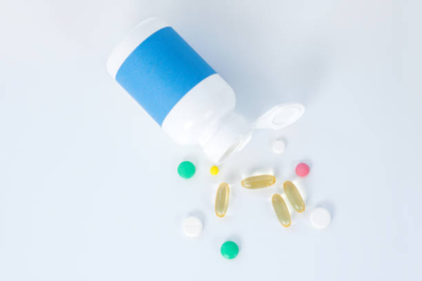 istock Many colorful capsules and pills on the table 1218525622