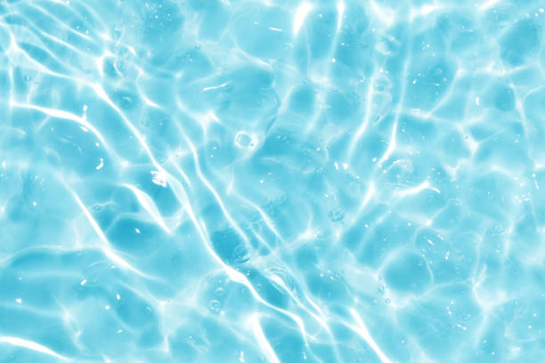 istock summer blue water wave abstract or natural bubble texture background 1218527087