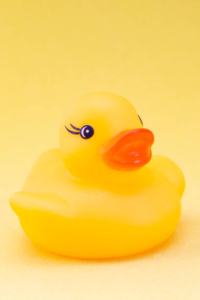 istock Rubber duck on a yellow background minimally creative concept. bathing babies 1218527672