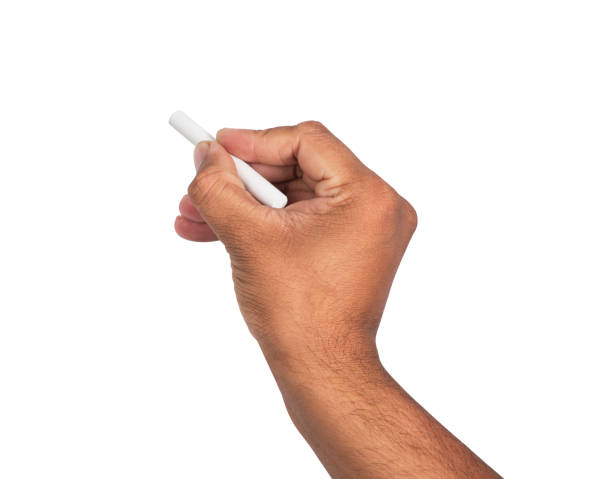 istock Hand with chalk isolated on white background 1218527871