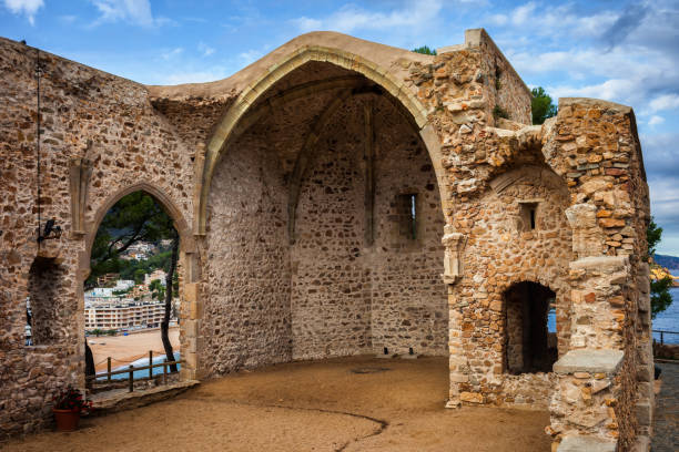 Gothic Church Of St Vincent In Tossa De Mar Ruins of Gothic Church of St. Vincent (Sant Vicenc) on Costa Brava in town of Tossa de Mar in Catalonia, Spain tossa de mar stock pictures, royalty-free photos & images