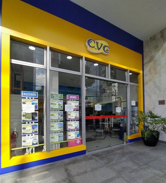 Facade of CVC store around Paulista avenue, Sao Paulo. Facade of a CVC store in the surroundings of Paulista Avenue, Sao Paulo, Brazil. CVC is the biggest tourism operator in Brazil and counts on a huge chain of franchises. cvc stock pictures, royalty-free photos & images