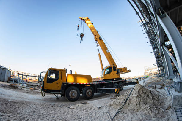 istock A large yellow truck crane stands ready to work on the construction site 1218528824