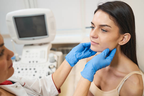 istock Serious young brunette female that visiting her doctor 1218529212