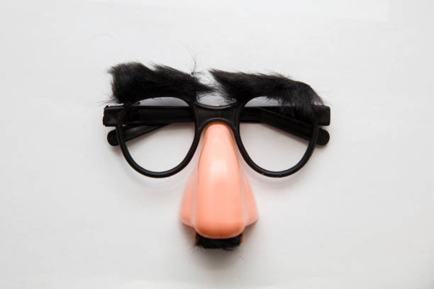 Closeup Of A Fake Nose And Glasses With Furry Eyebrows Stock Photo