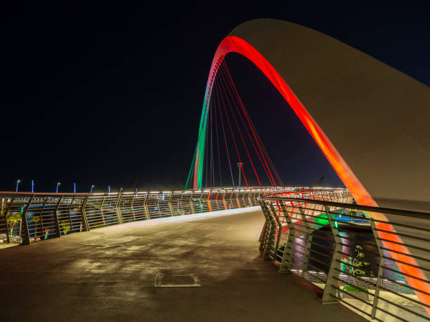 istock Pedastrian rope bridge in Dubai at night 1218529495