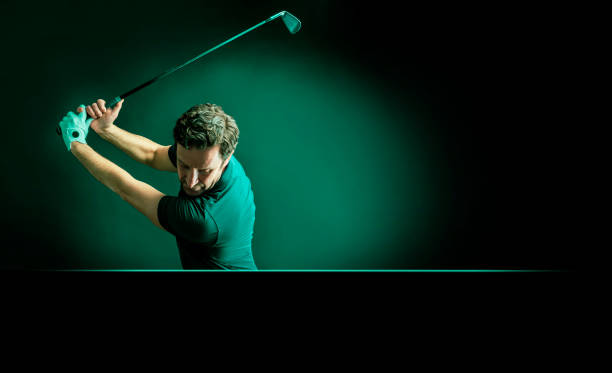 istock Close-up of a golf player intent on perfecting the swing 1218530868