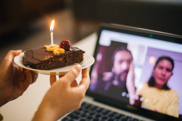 istock Woman celebrating birthday with video conference 1218531668
