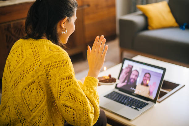istock Woman celebrating birthday with video conference 1218531677
