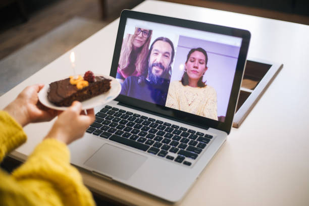 istock Woman celebrating birthday with video conference 1218531689