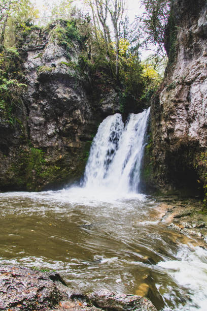 istock Venoge waterfall in the fall (Canton of Vaud, Switzerland) 1218531751