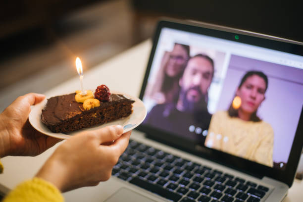 istock Woman celebrating birthday with video conference 1218531793