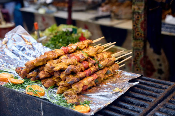 delicious chicken skewers on a barbecue stock photo