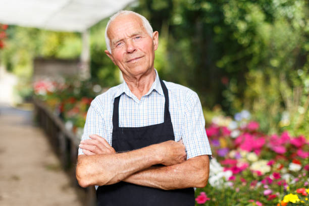 istock Senior man in glasshouse 1218532184