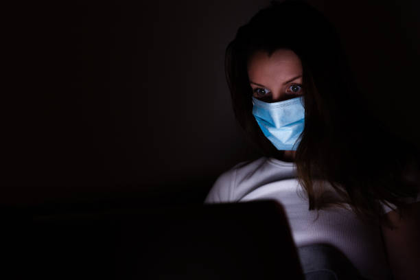 istock Woman with medical face mask. 1218537313