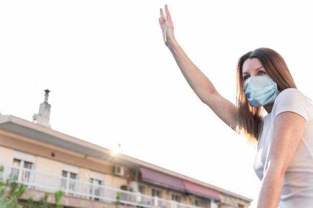 istock Woman with medical face mask. 1218537315