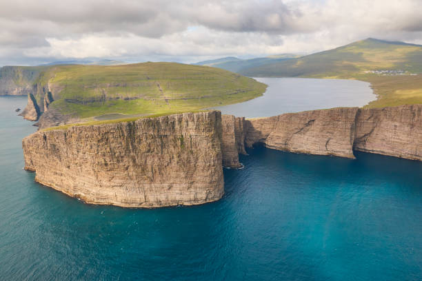 istock Faroe islands dramatic coastline in Vagar. Leitisvatn lake 1218537666