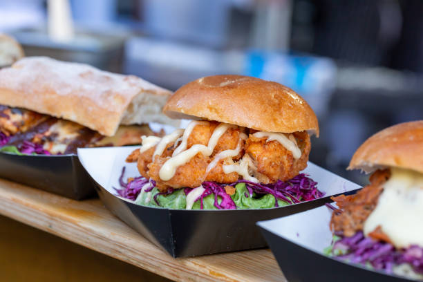 istock Chicken burgers displayed on a market stall 1218537718