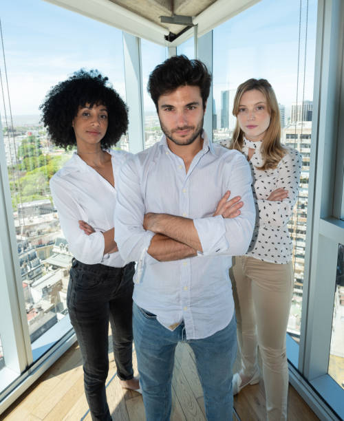 istock Mixed business team posing, in Buenos Aires skyscraper 1218539049
