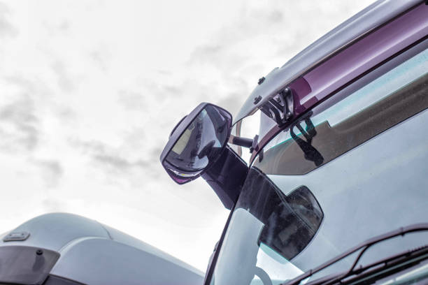 istock Rearview truck mirror and dead zone view. Visibility at the wagon, a mirror on the windshield, security, copy space 1218539088