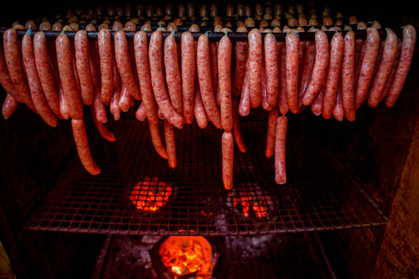 istock making process of thai tradition pork sausage in charcoal oven 1218540935