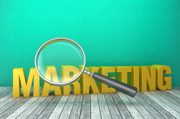 istock 3D Word MARKETING with Magnifying Glass - 3D Rendering 1218541096