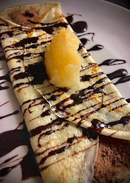 istock Chocolate crepe with apple sauce 1218541198