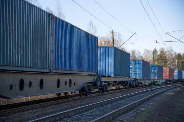 istock Cargo containers transportation on freight train by railway. Coronavirus Wreaks Havoc On Global Industry. Global economy is heading into a recession thanks to the widening fallout from the COVID-19 1218542710