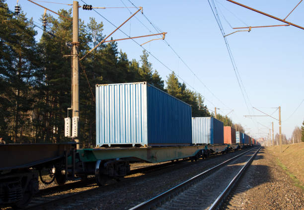 istock Cargo containers transportation on freight train by railway. Coronavirus Wreaks Havoc On Global Industry. Global economy is heading into a recession thanks to the widening fallout from the COVID-19 1218543450