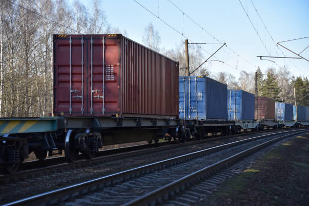 istock Cargo containers transportation on freight train by railway. Coronavirus Wreaks Havoc On Global Industry. Global economy is heading into a recession thanks to the widening fallout from the COVID-19 1218543521