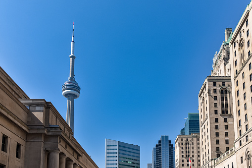 Emblematic buildings of the Toronto skyline, on a sunny day with blue skies. Toronto, Ontario, Canada