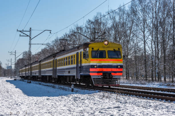 istock Soviet Era Electric Train Traveling in Winter in Latvia 1218554290
