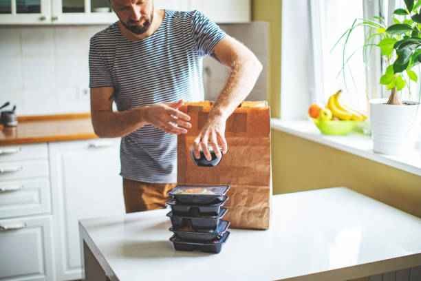 Takeaway meals at home during quarantine Takeaway meals at home during quarantine bag lunch stock pictures, royalty-free photos & images