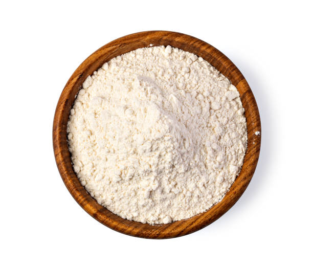 istock bowl of flour on white background 1218556292