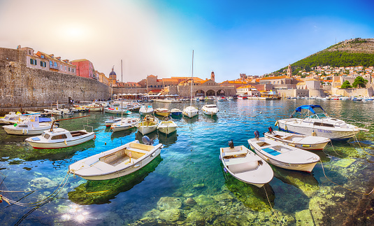Old port of the historic town Dubrovnik. Bay with  lots of boats in turquoise water. Location:  Dubrovnik, Dalmatia, Croatia, Europe