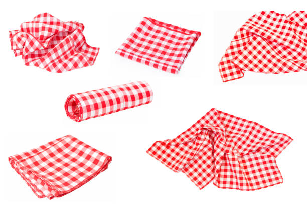 Collage of red checked fabric napkins isolated on white background