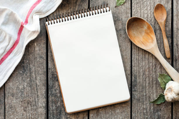 istock Blank recipe cooking book and utensils. Top view with copy space 1218559701