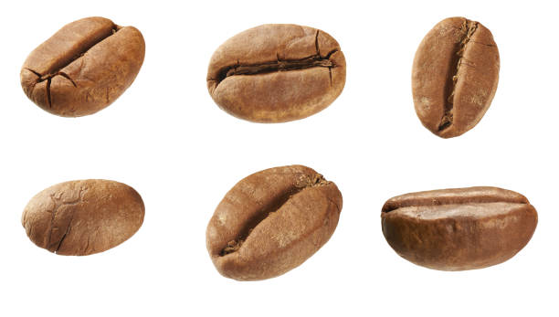 istock Close up of coffee beans isolated on white with clipping path 1218560802