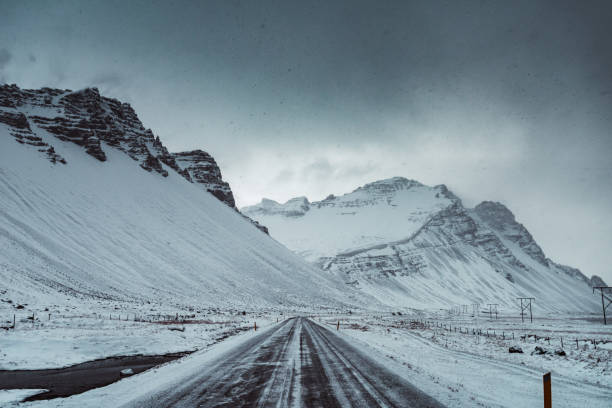 empty road in iceland during the snowstorm