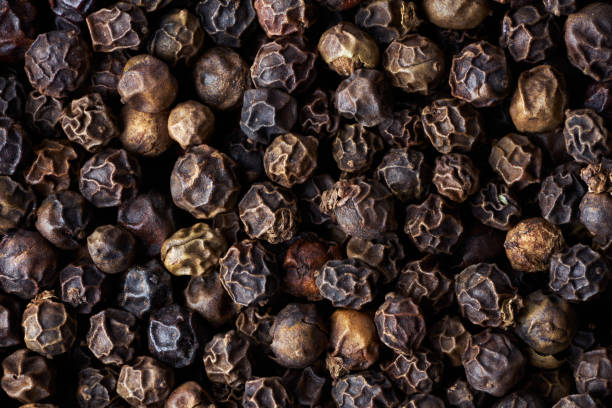 istock Closeup heap a whole pepper seeds. 1218562923