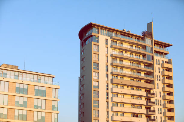 istock A high multi-family apartment block against a blue sky. 1218562970