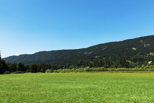 Panoramic view of the landscape near Fusine during summer season (Fusine, border to Slovenia, UD, FVG, Italy).
